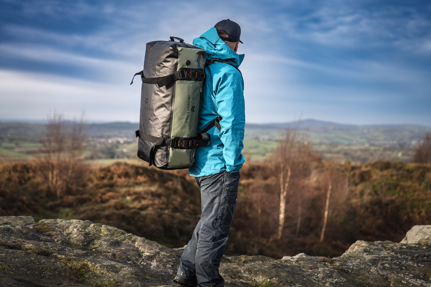 Duffel bag wet mountain scene