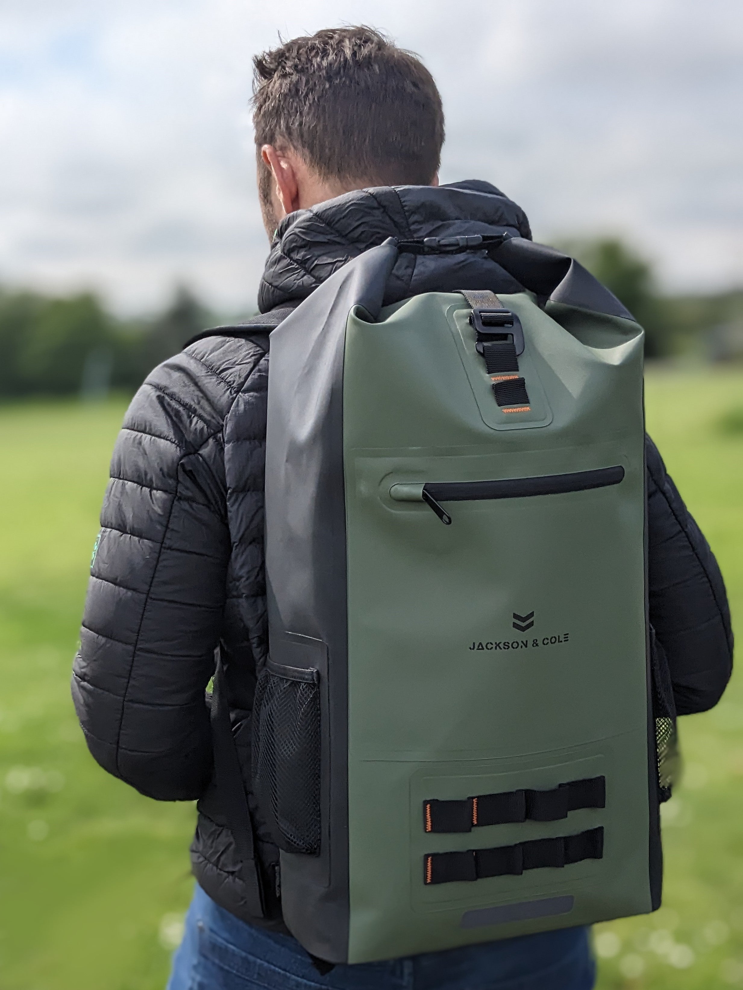 Man wearing waterproof backpack