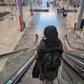 Lady wearing ancona backpack in airport