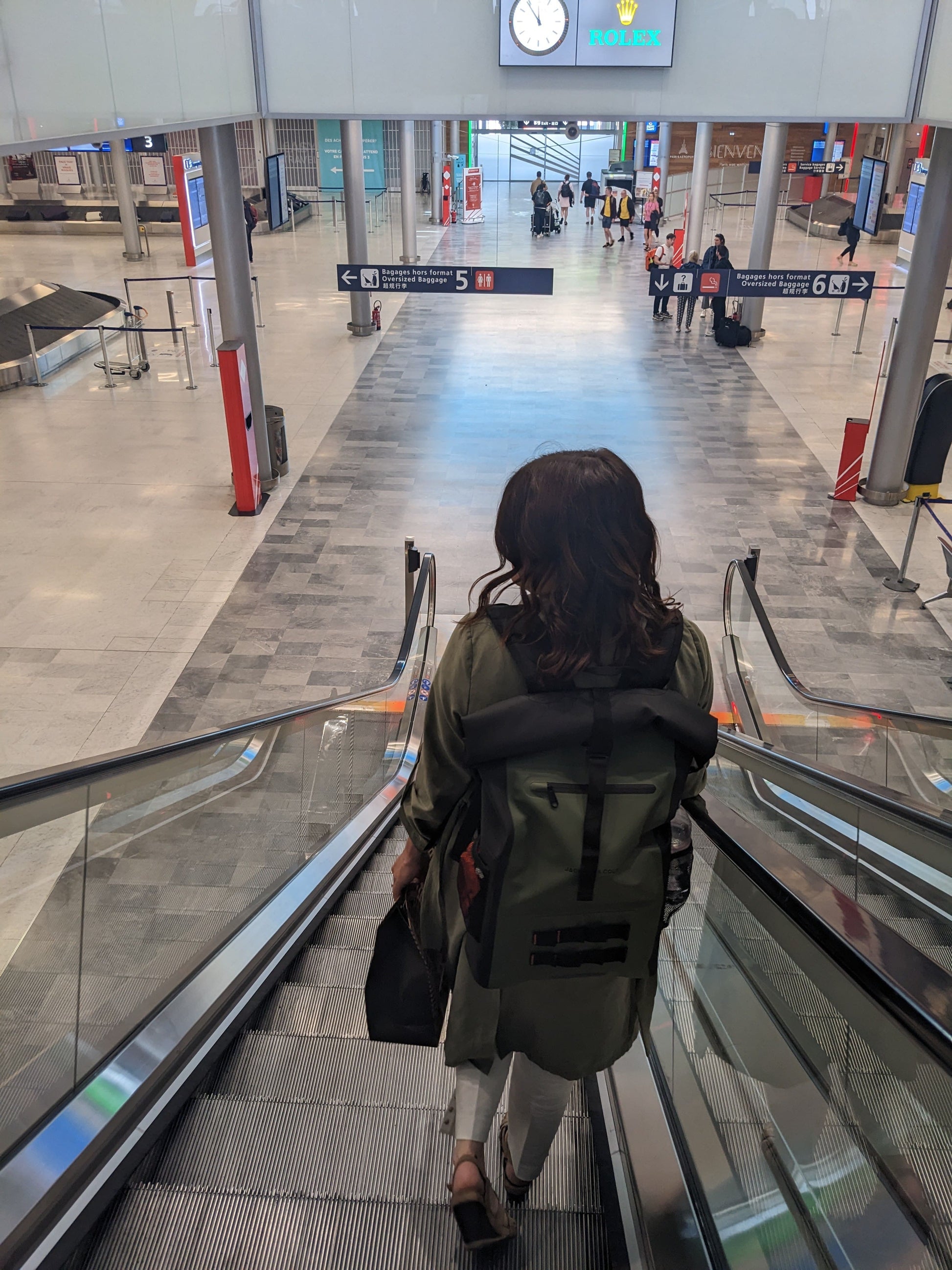 Lady wearing ancona backpack in airport