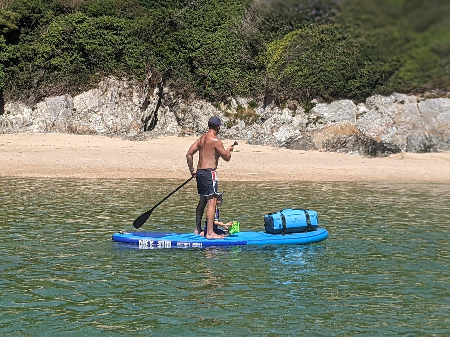 Duffel bag attached to SUP